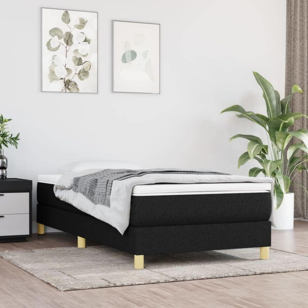 Das Boxspringbett misst 90 x 200 cm in Schwarz