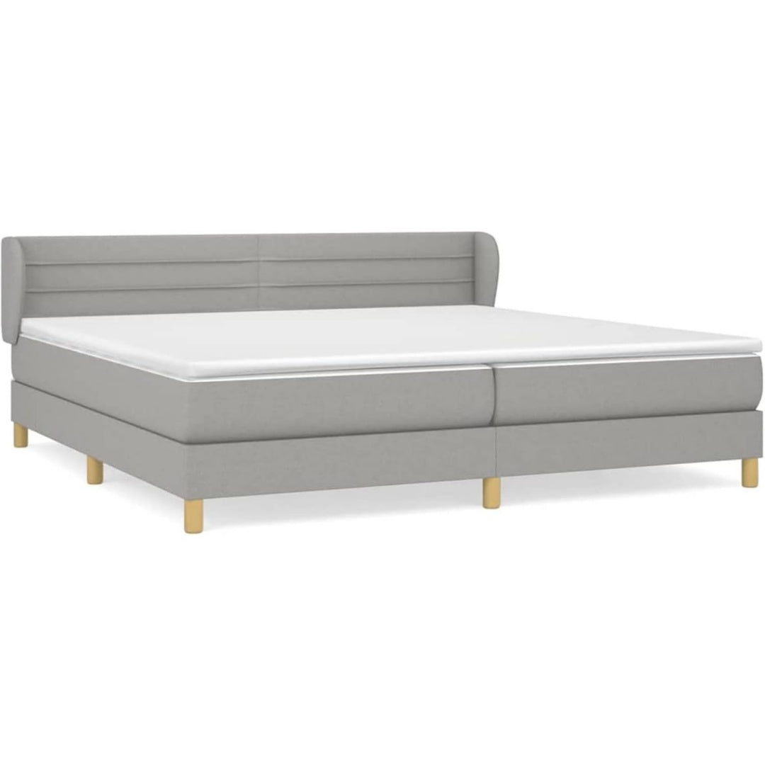 Boxspringbett mit einem Lattenrost, Hoehenverstellung und einem Taschenfederkern